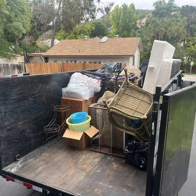Truck loaded with junk removal items